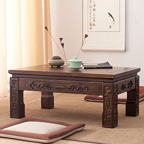 Table basse en bois compacte en orme pour optimiser les petits salons sans perdre de style
