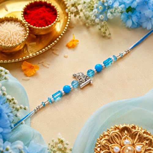 Image of Designer Shree Krishna Motif Rakhi for Brother with Roli Chawal Pack, Elegant Blue Beaded Rakshabandhan Thread, Traditional Rakhi Gift for Bhaiya