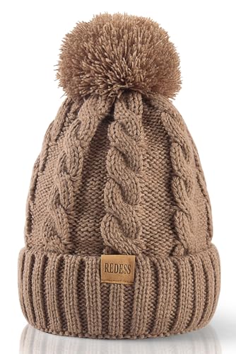 Bonnet d'hiver femme chaud avec pompon protégeant du froid glacial et du vent de montagne