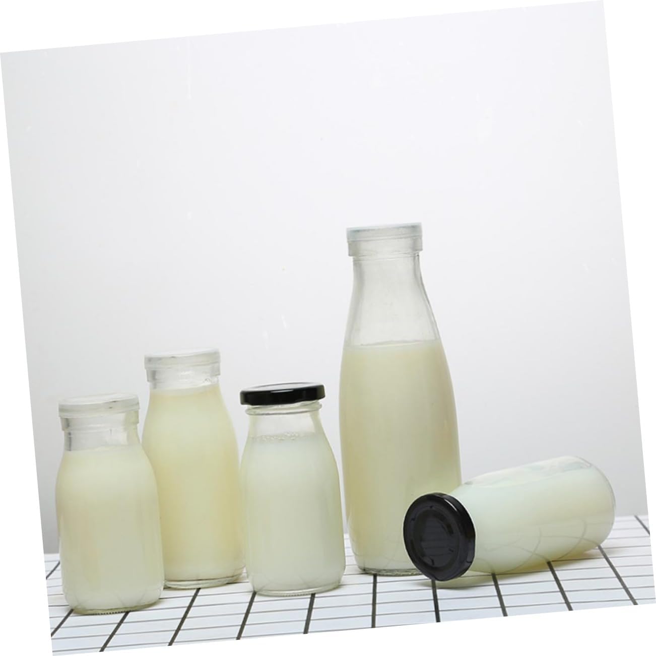 KICHOUSE 4pcs Juice Bottles Glass Milk Containers Lids Leakproof Dishwasher Safe