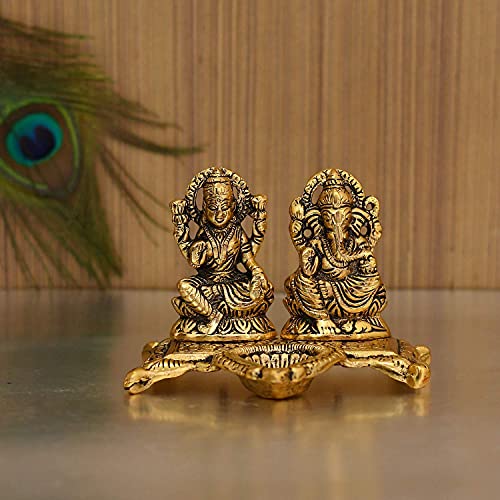 Image of CraftVatika Rakhi Gift Hamper for Brother and Bhabhi Kids with Gift Set, Metal Laxmi Ganesh Idol Showpiece Diya 4 Puja Rakshabandhan Combo Gift 4 Bhai Sister Fancy Rakhi with Gift Hamper (Laxmi Ganesh diya)