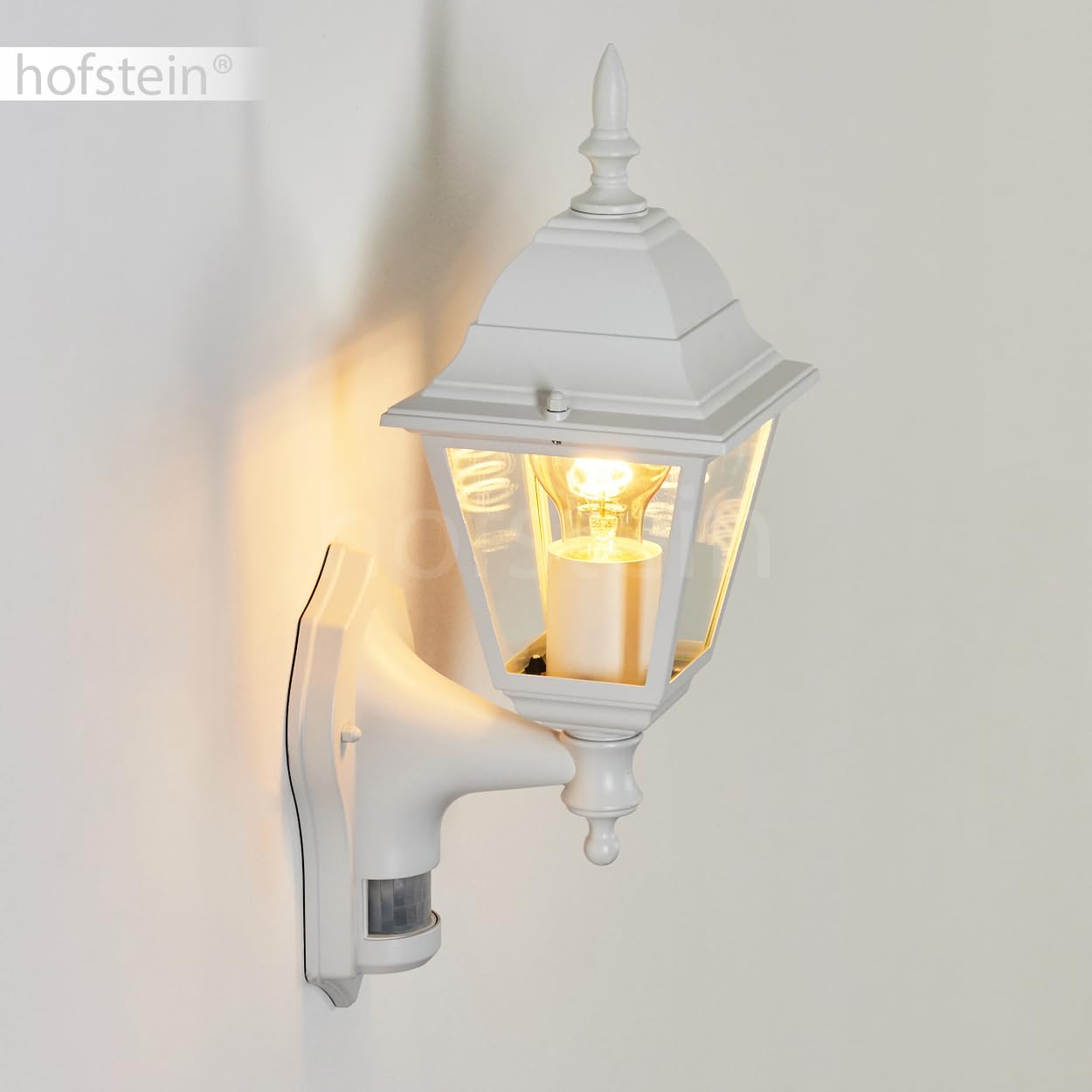 Zewnętrzna lampa ścienna Naofe, lampa ścienna z czujnikiem ruchu wykonana z metalu/szkła w kolorze białym/przezroczystym, lampa ścienna, lampa zewnętrzna na taras, E27, bez żarówki