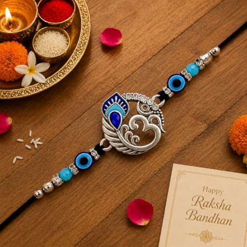 Image of Riddhika Ventures Religious Meenakari Om and Peacock Feather Rakhi With Roli Chawal And Greeting Card