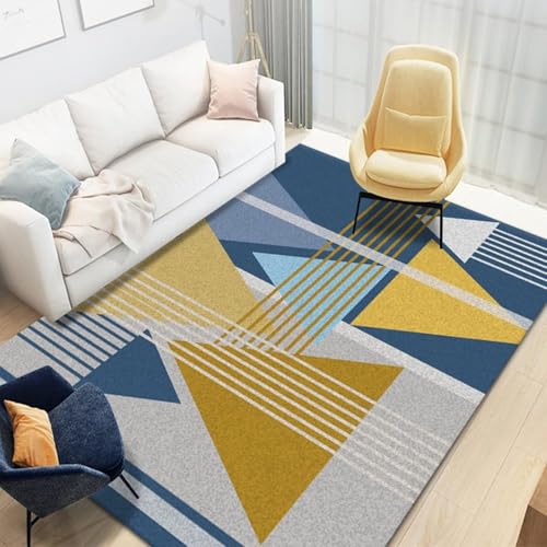 Tapis géométrique bleu ciel et marine pour réchauffer votre coin cheminée