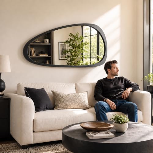 Image of Solid Wood 48x24 Matte Black Large Organic Irregular Wall Mirror | Large black statement adds modern contrast to bedroom walls, hallways, entryways, living rooms, dresser decor, black accents.