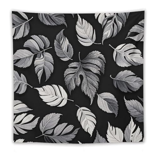 Décoration murale feuilles noires pour camoufler un mur blanc