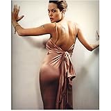 Angelina Jolie Backside View Wearing Pink Satin Dress Low Cut Back Tied in Back Head Turned Looking Back Hands on Wall Mouth Parted Closeup 8 X 10 Inch Photo