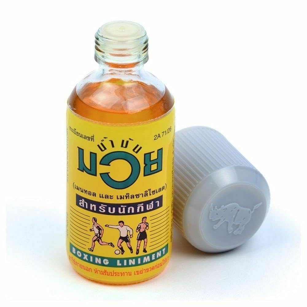 Muay Thai Boxing Liniment Oil 120 ml - Huile de massage échauffement sportif - Arômes herbacés - Flacon verseur - Pré et post entraînement