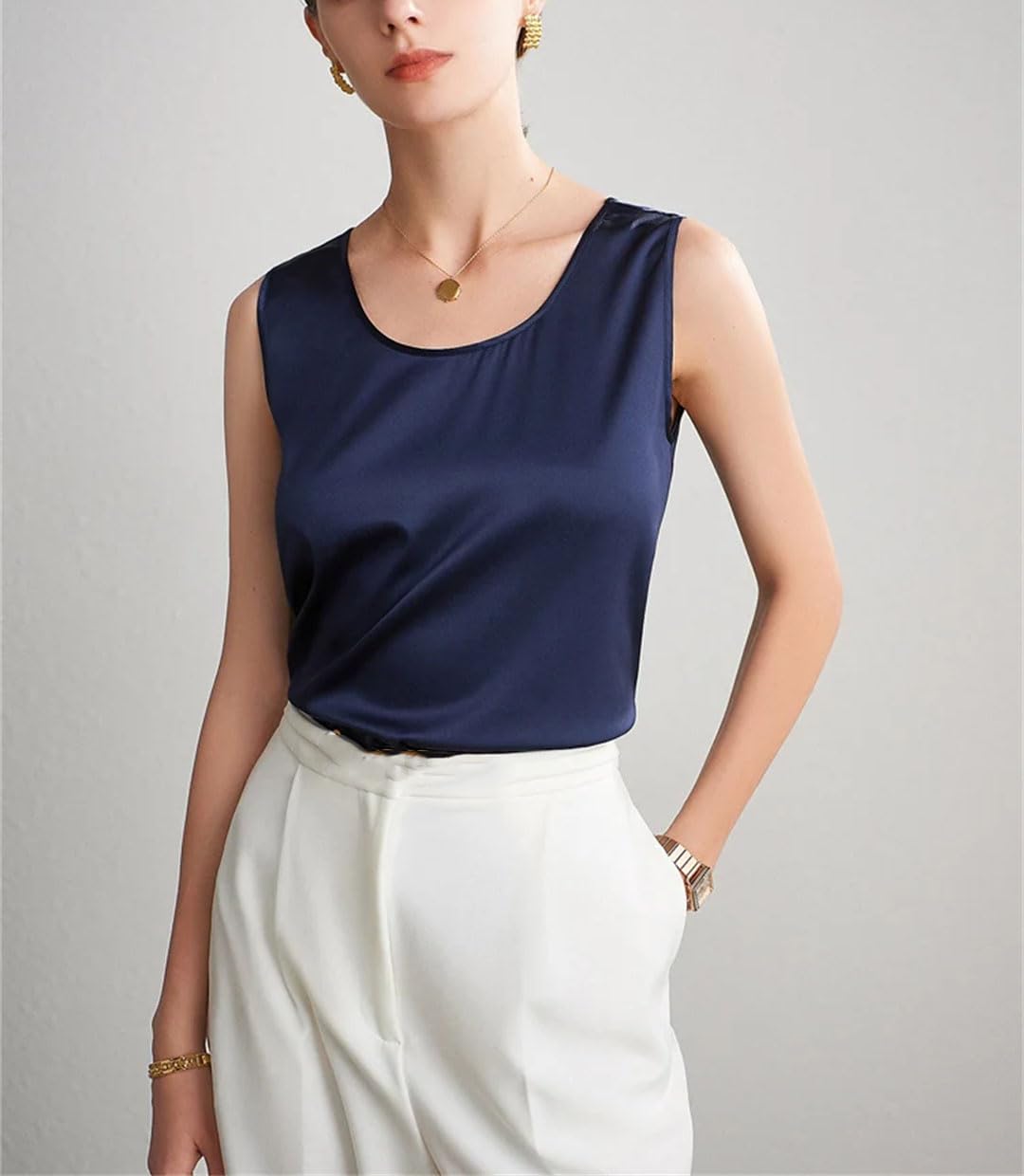 Camiseta básica y acogedora para mujer, cuello redondo, sin mangas, elegante, color liso