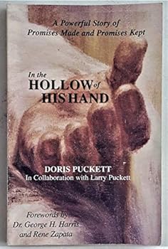 Paperback In the Hollow of His Hand Book