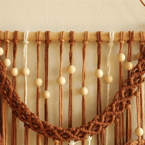 Pompons tentures murales macramé pour habiller un mur vide