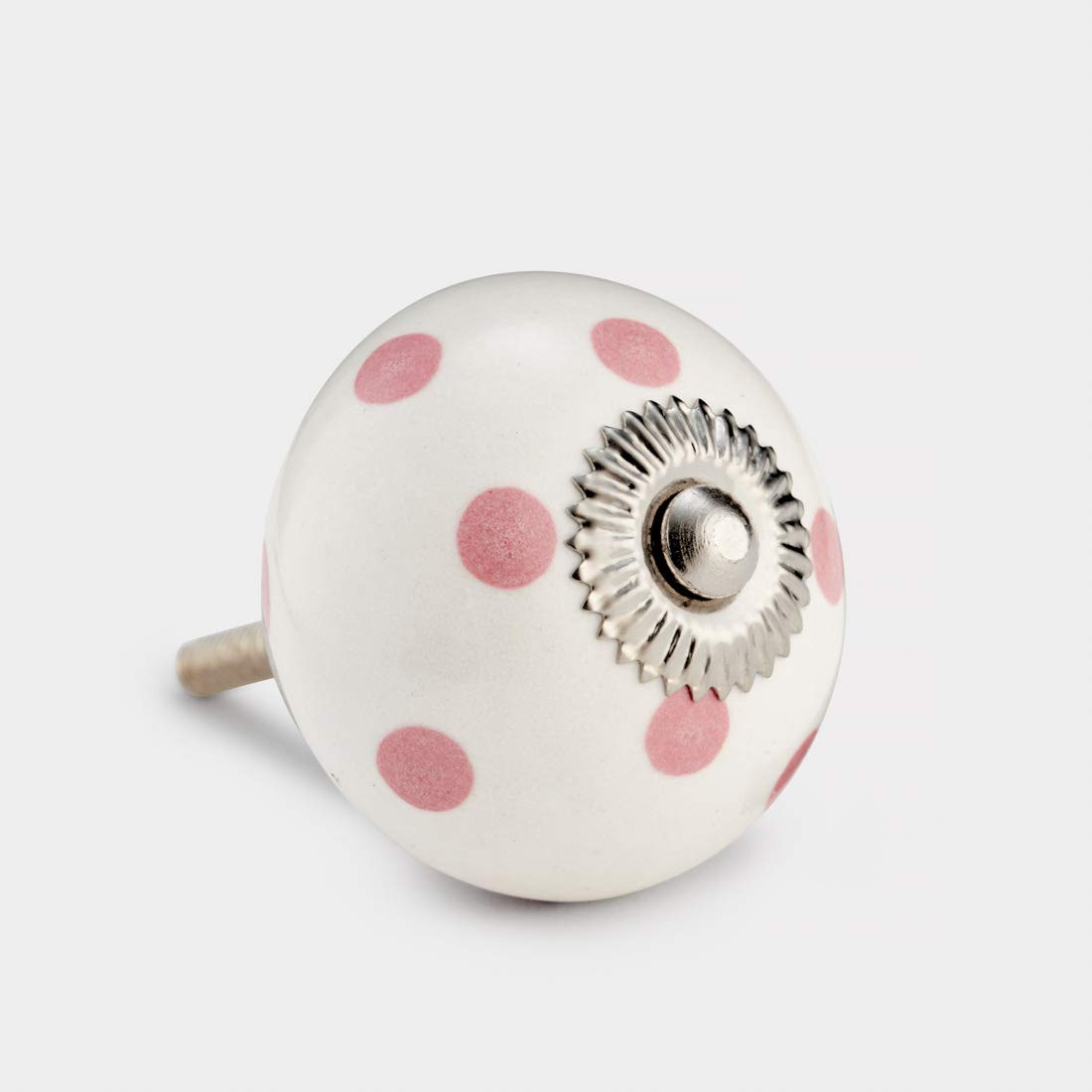 Pushka Home Vintage Chic White Pink Spotted Painted Ceramic Cupboard Door Knob. Sold individually. 40mm white with pink polka dots handle. Suits doors up to 27mm thick. Retro door pull for decorating your furniture.