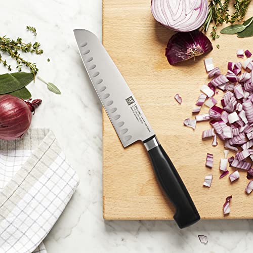 Image of ZWILLING Four Star 7-inch Hollow Edge Santoku Knife