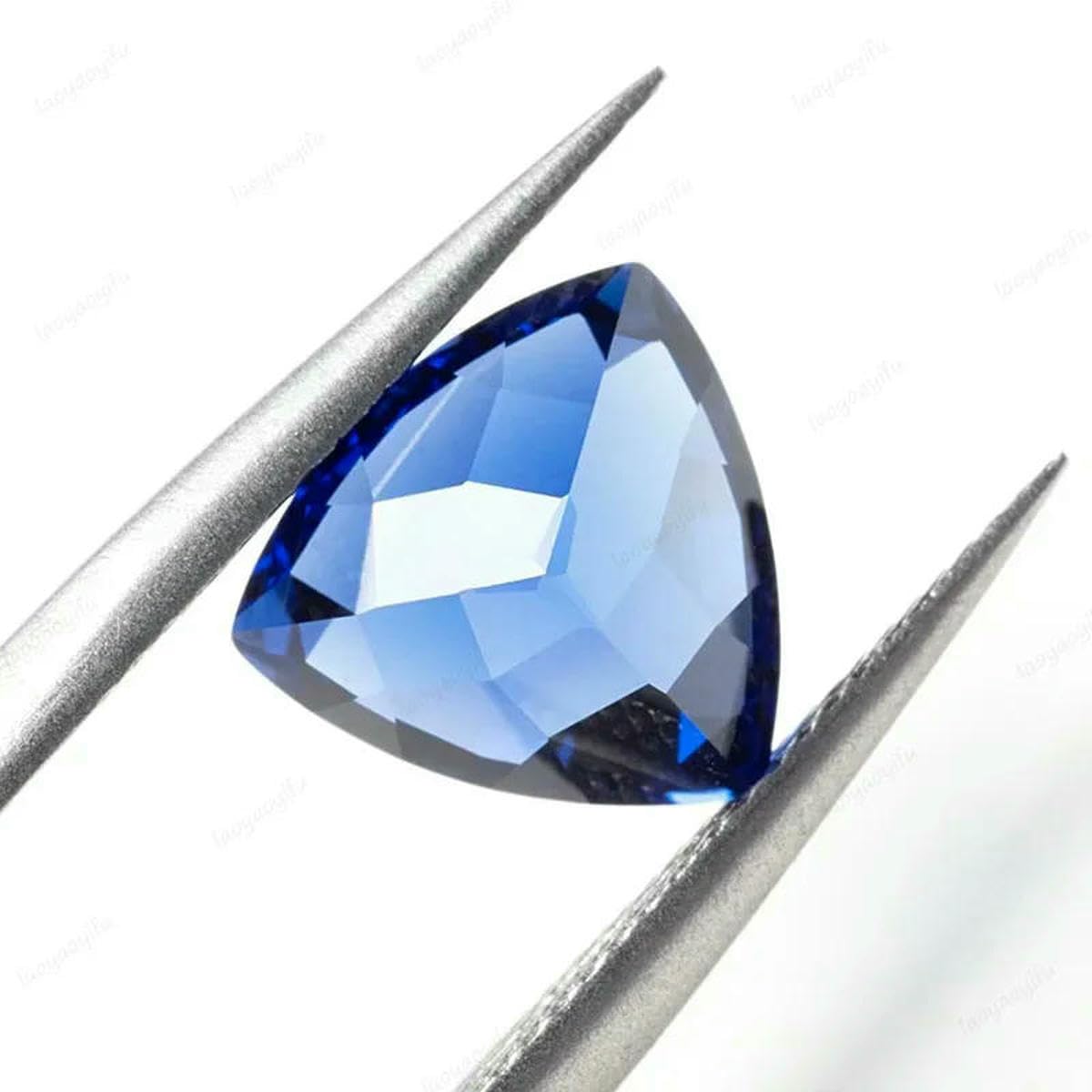 Schmuckanhänger aus königsblauen Edelsteinen in verschiedenen Formen – 13 x 18 mm – ca. 21 ct – mit AGL-Zertifikat