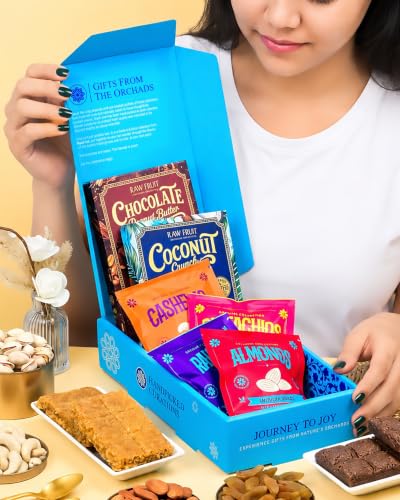 Image of Hyperfoods Rakhi Set for Brother and Bhabhi RawFruit Gifts From The Orchards Dry fruit 120 Grams(Cashews, Almonds, Pista, Raisins 30Gms Each) & 2 Brittle(100 Gm Each) with Rakhi Hamper For Brother with Roli & Rice