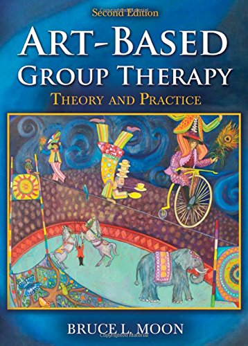 Bruce Moon speaking at an art therapy conference with a group of participants engaged in creative activities