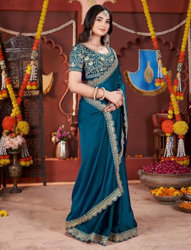 Image of DHARMEE Women's Elegant Designer Sarees Premium Rangoli Fabric with Embellished Border, Lightweight and Stylish Ethnic Wear - Perfect for Parties, Weddings, and Festive Occasions..