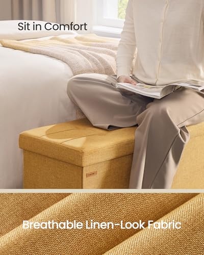 Image of SONGMICS Mazie Collection - Storage Ottoman Bench, 43 Inches Folding Foot Rest Stool, End of Bed Bench, Easy Assembly, for Living Room, Bedroom, Entryway, Ginger ULSF077K04