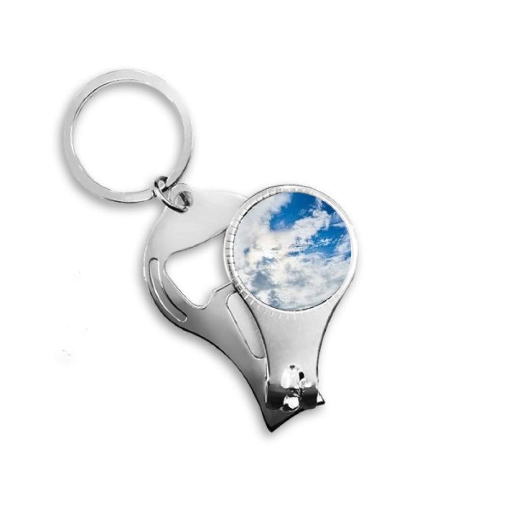 Porte-clés décapsuleur nuages bleus pour vos sorties d'été