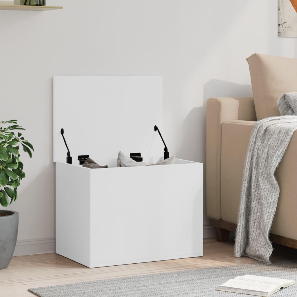 Baúl almacenaje blanco 60 cm, madera ingeniería resistente humedad. Amplio espacio ropa, mantas, juguetes. Tapa con elevación gas, uso como mesa centro. Fácil montaje, carga 125 kg. Versátil salón, do