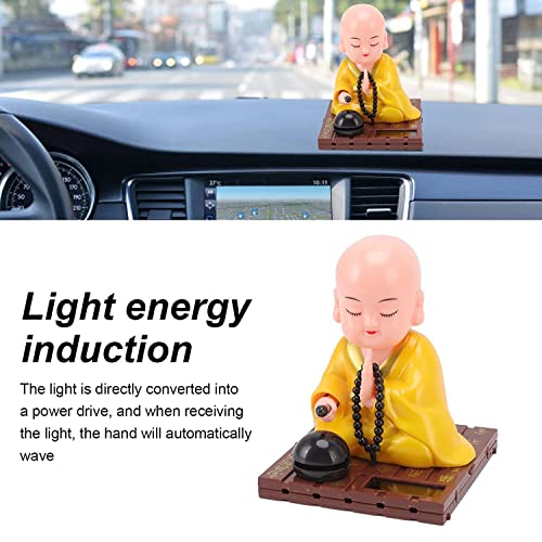 Image of AUGEN Small Buddhist Monk Solar Ornaments, Automatic Nodding Lucky Meaning Light Energy Sensing Eco Friendly Solar Buddhist Monk Statue Decoration for Home Car Dashboard (Pack of 1)(D, Yellow)