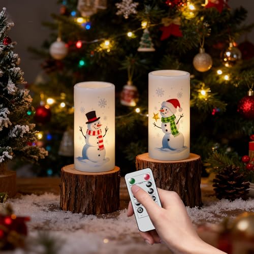 Image of Eldnacele Christmas Snowman Flameless Candles Battery Operated with Remote and Timer Real Wax Flickering LED Pillar Candles Xmas Holiday Indoor Decor(2 Pack, 3 inch D x 6 inch H)