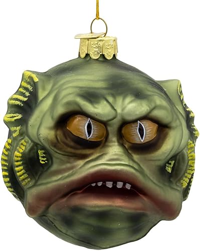 Adorno de monstruo de agua con cara de pez