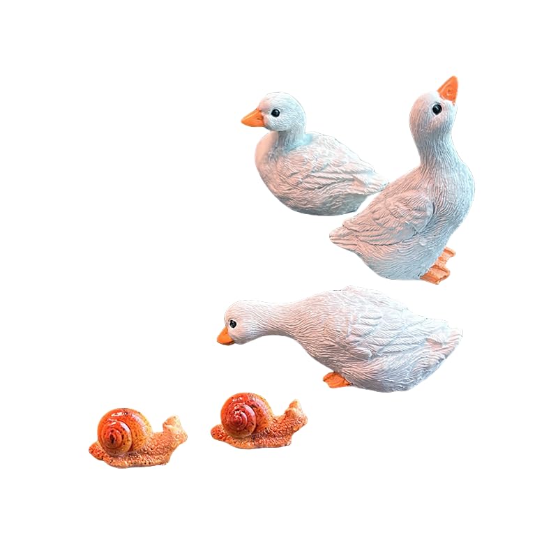 Décoration de jardin canard blanc et escargots pour égayer vos plantes en pot et parterres