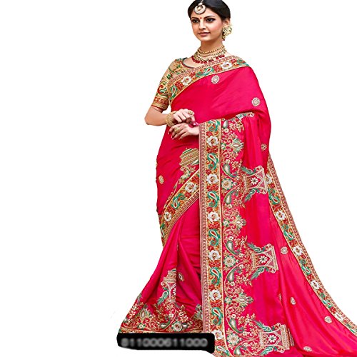 Robe de mariée sari en soie rose pour célébrer un mariage traditionnel unique
