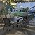 PIZZELLO 11 Pieces Outdoor Dining Set, 106" Aluminum Extendable Patio Dining Table w/ 10Pcs Stackable Textilene Chairs, All Weather Outdoor Table and Chairs Sets for Backyard, Garden and Deck
