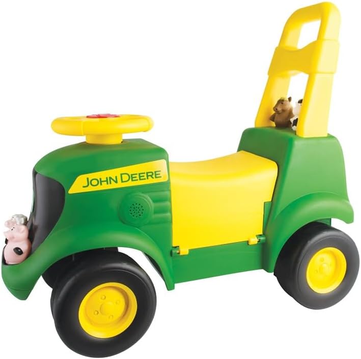 Child playing with the John Deere Sit 'N Scoot Activity Tractor, with the seat open revealing a farm playset.