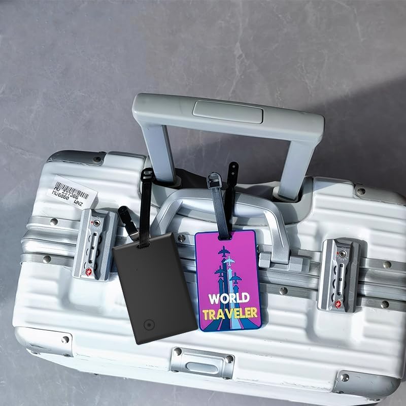 Novzix S11 tracker card attached to luggage with a 'World Traveler' tag