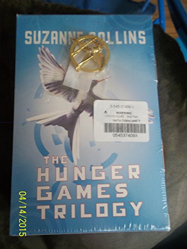 The Hunger Games Trilogy with Pin (Hunger Games... 054537409X Book Cover