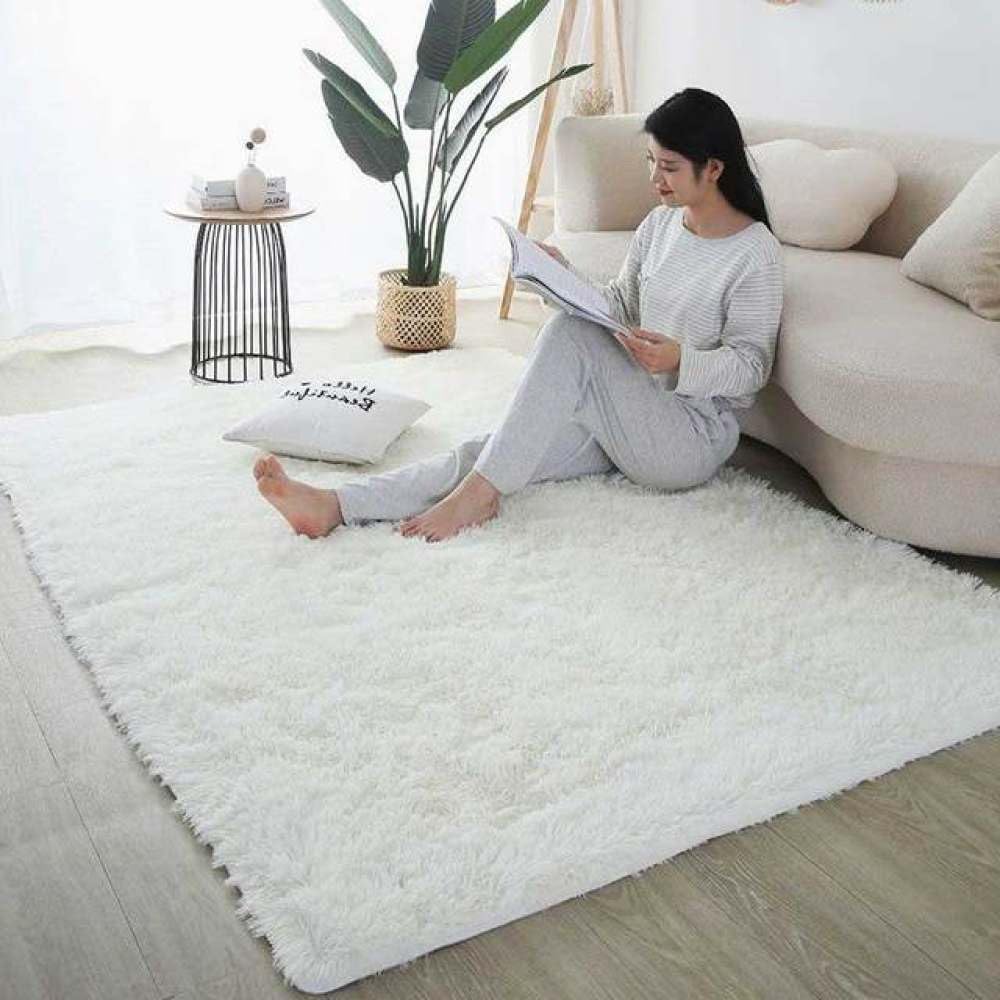 Tapis de salon en peluche doux pour réchauffer le sol d'une chambre