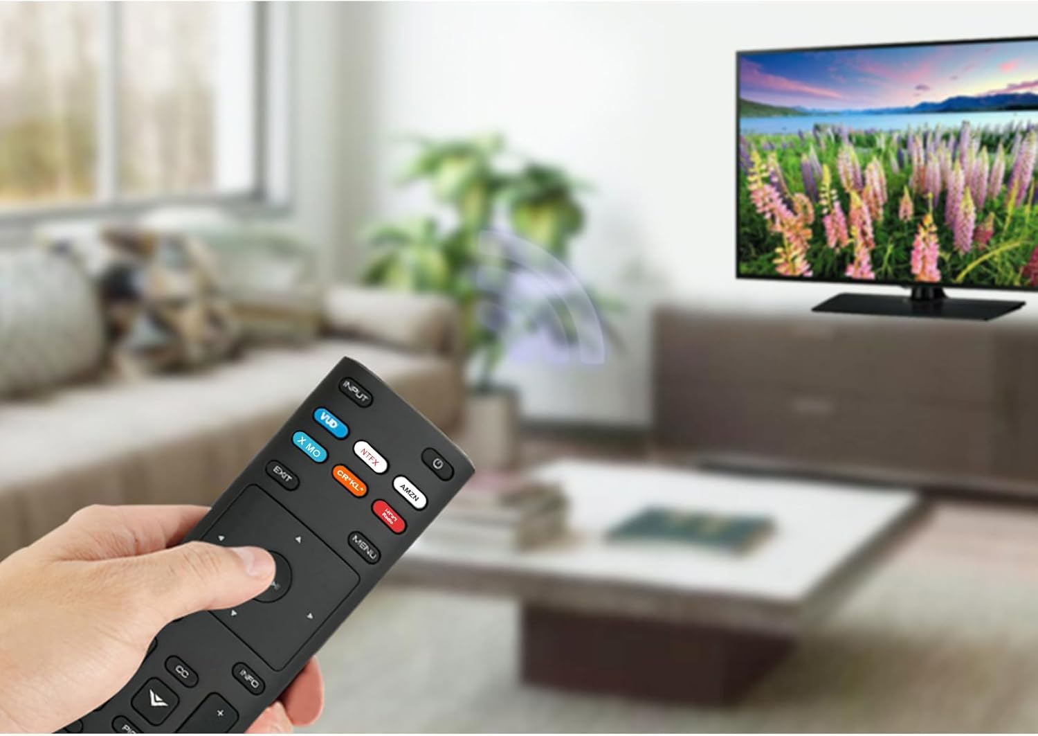 The XRT136 remote control shown with its length and width dimensions indicated.