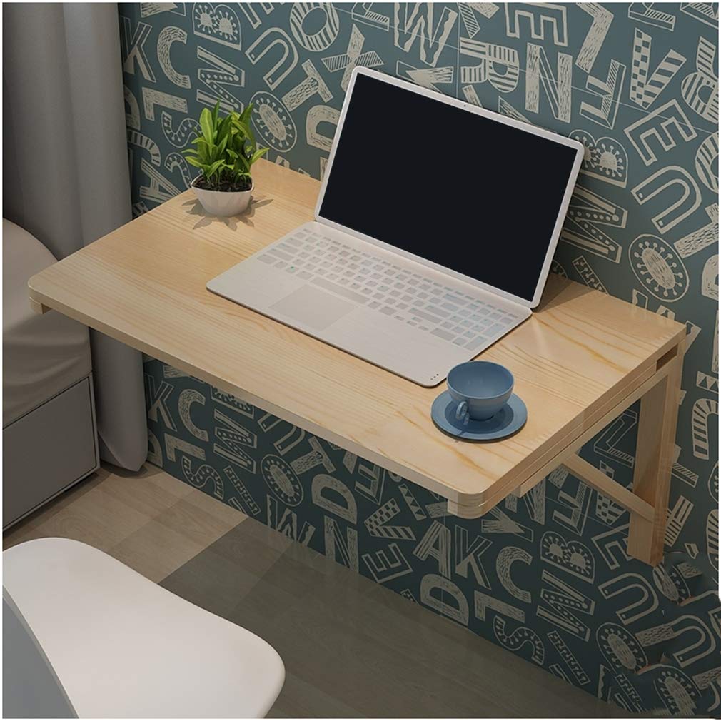 Table murale pliante en bois sur le balcon pour un café au soleil