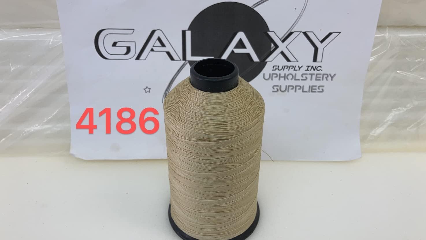 69 Upholstery Thread TEX-70 Bonded Nylon 8 oz Deer Color. UPC69807. Made in The U.S.A Free with One Piece Galaxy Supply 5" Seam Ripper.