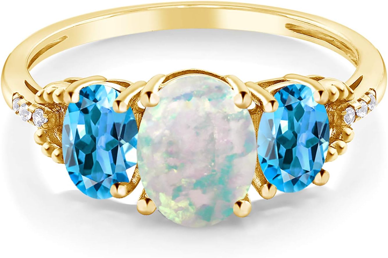 Gem Stone King 10K Yellow Gold Oval Cabochon White Simulated Opal Swiss Blue Topaz and Diamond Accent 3-Stone Engagement Ring For Women | 2.14 Cttw - Image 2