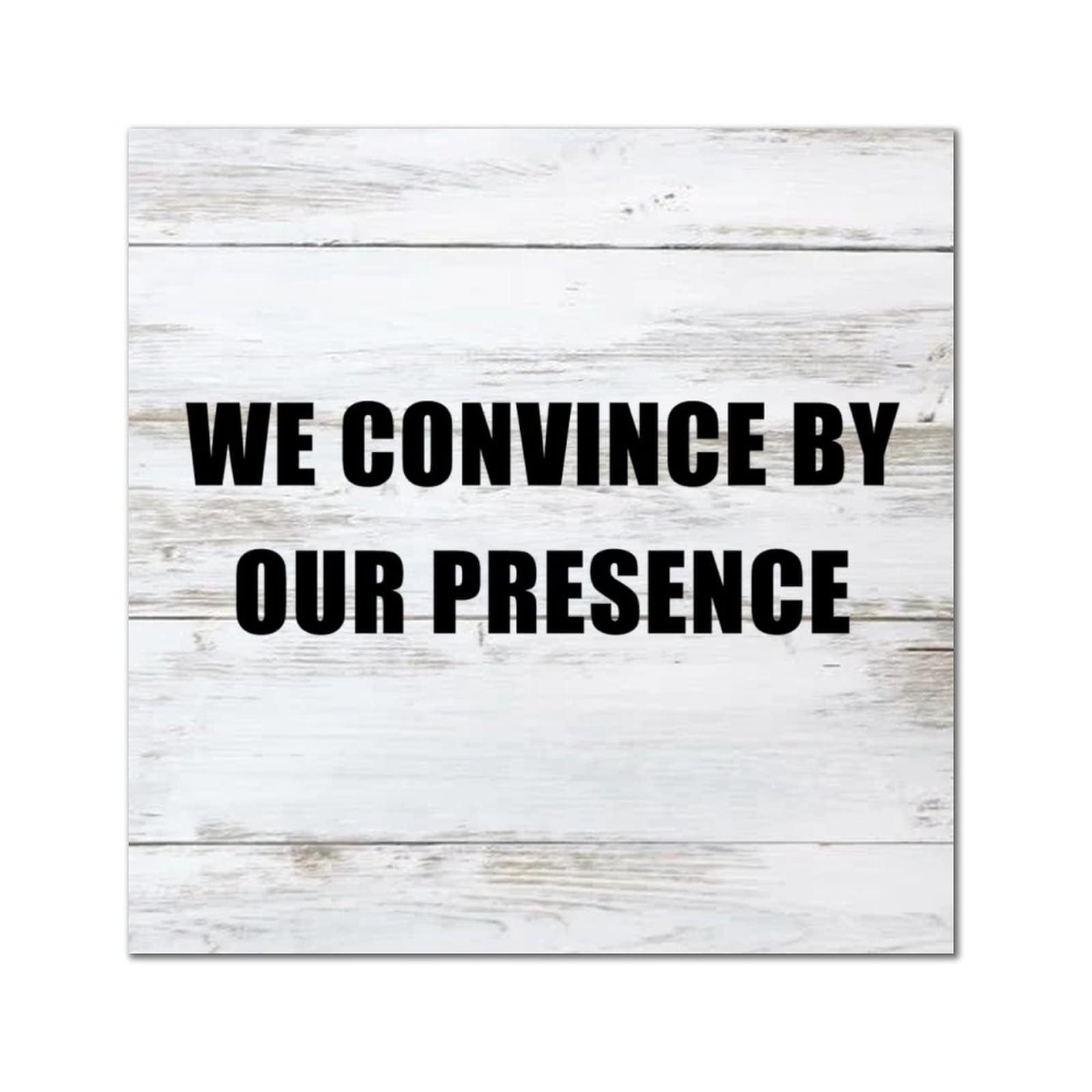 Inscription « We Convince by Our Presence » panneau bois finitions