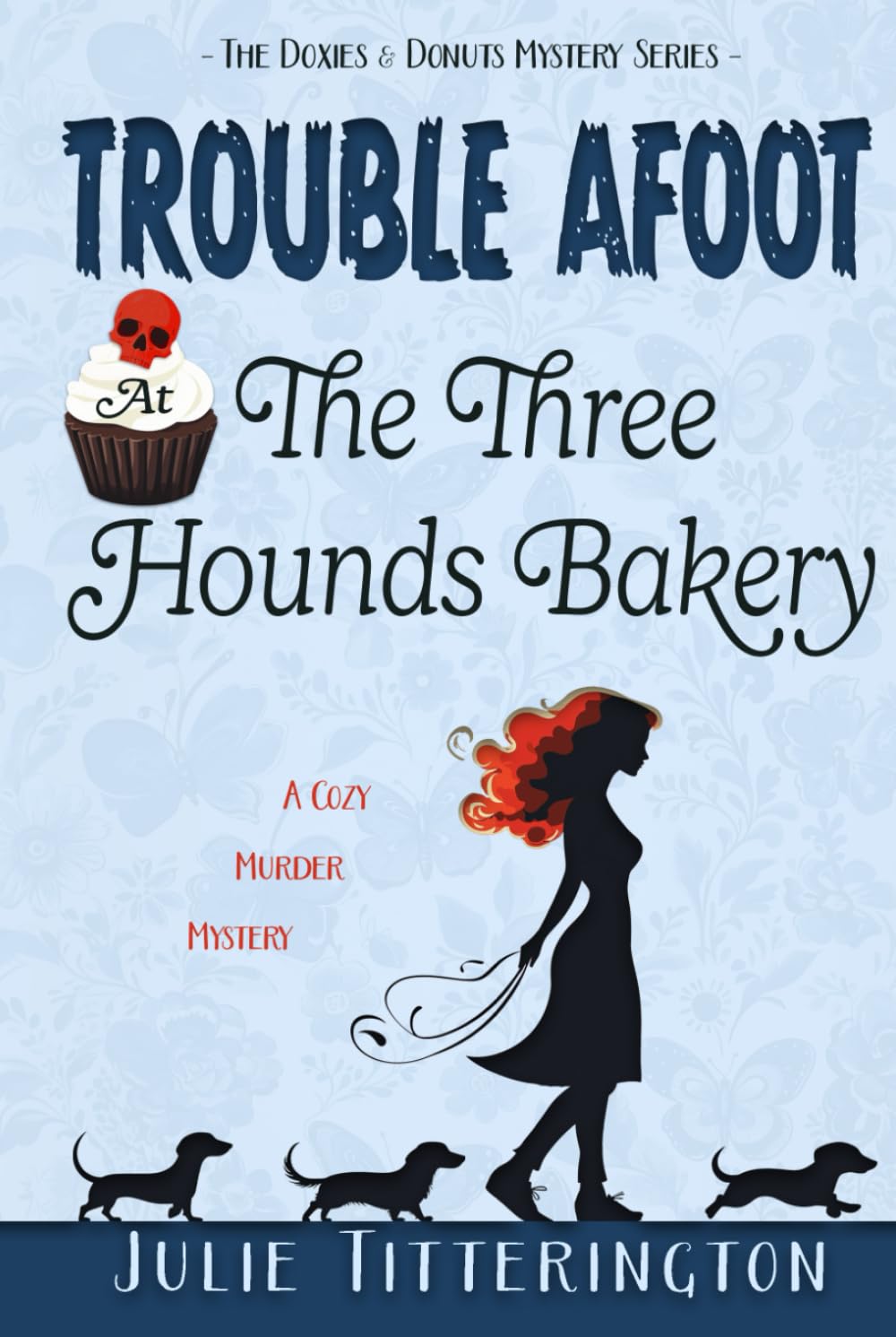 Trouble Afoot At The Three Hounds Bakery: A Cozy Murder Mystery (The Doxies & Donuts Mystery Series)