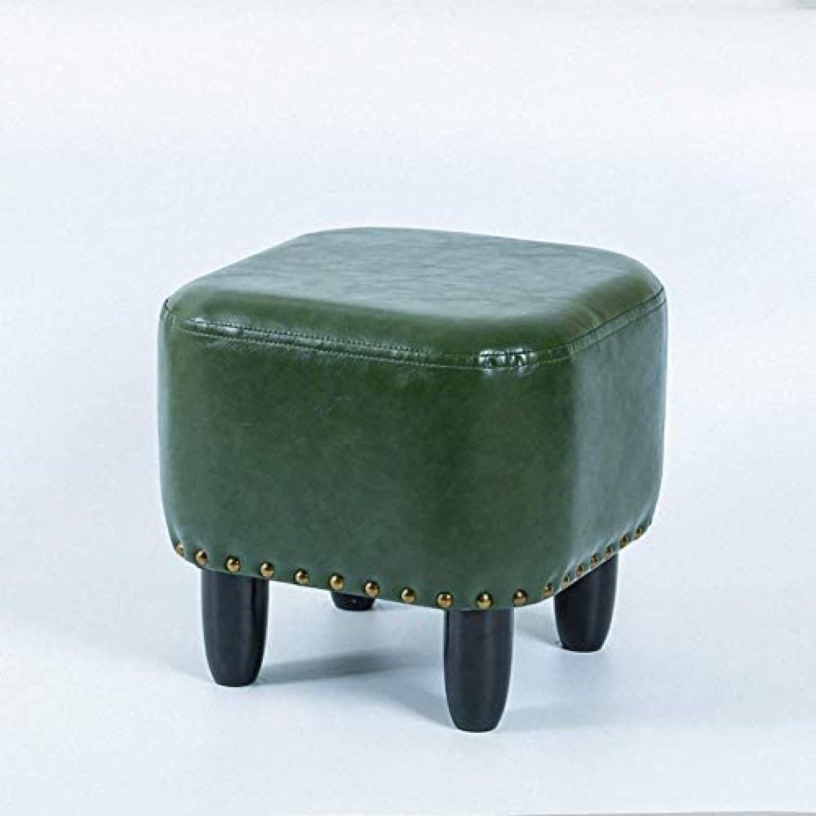 Pouf repose-pieds vert en cuir pour sublimer votre coin lecture salon