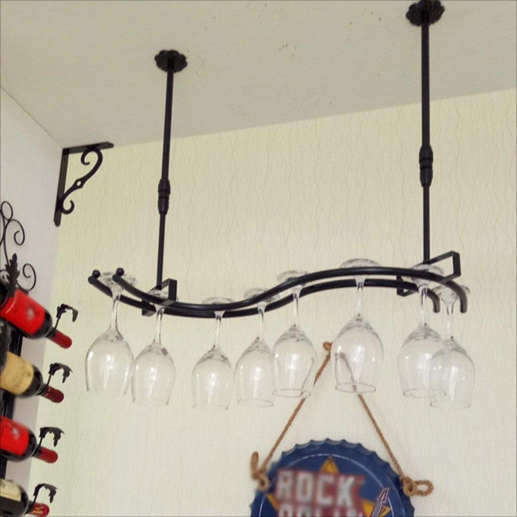Mostrador de bar con estantes de vino retro para organizar copas en tu restaurante