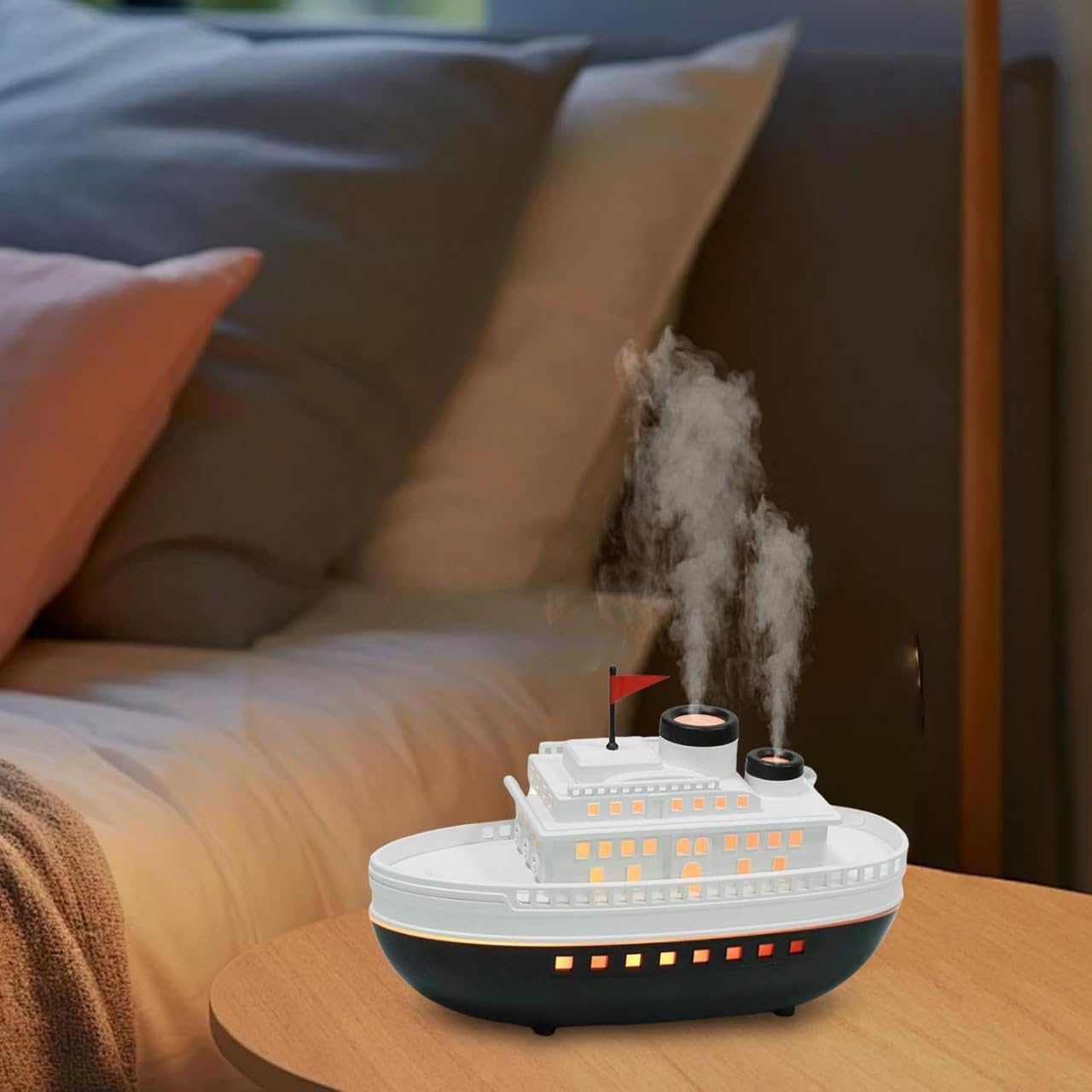 - Creative Ship Humidifier with LED lights and dual mist outlets. Perfect for bedrooms, offices, and gifts. Adds moisture, improves air quality, and enhances décor with unique design