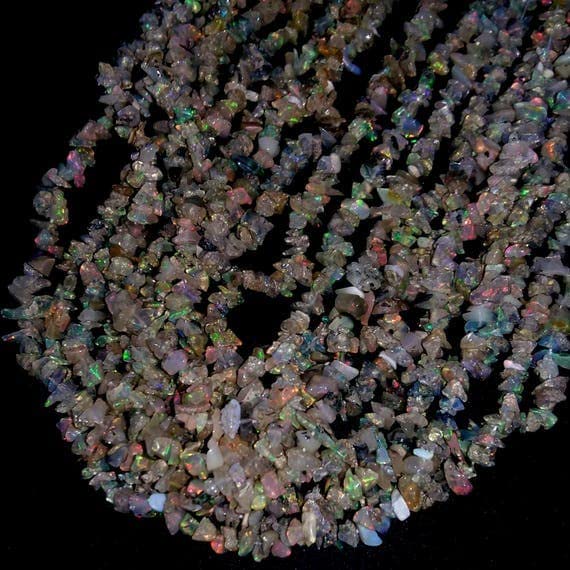 Perles d'opale d'Éthiopie lisses : oubliez les pierres coupantes pour vos bijoux de peau