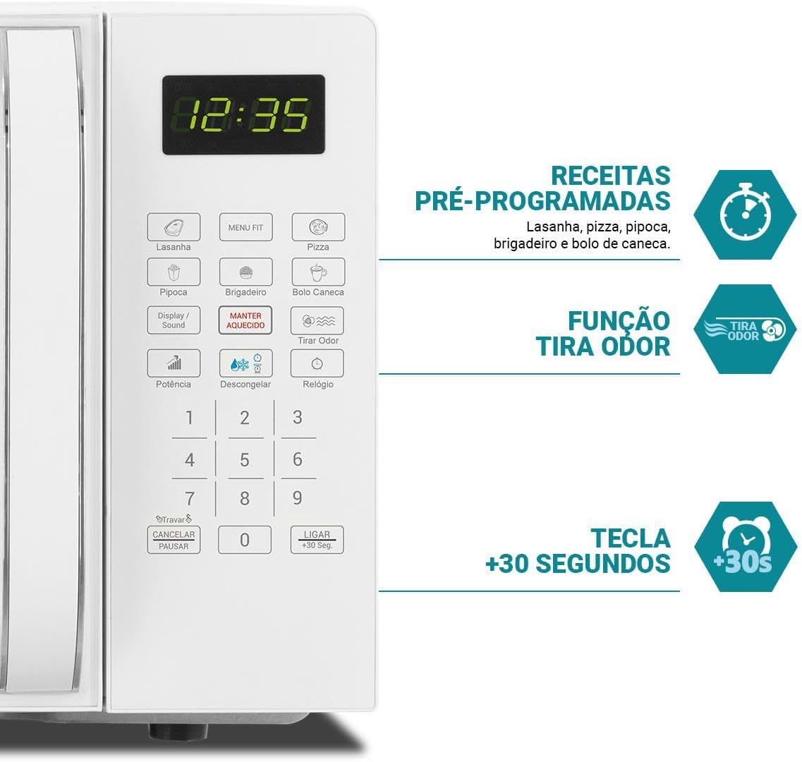 Imagem frontal do micro-ondas com fundo branco e neutro. Imagem frontal do micro-ondas com fundo branco e neutro.