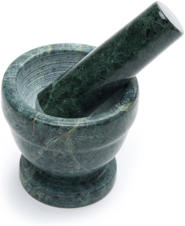 A small green marble mortar with matching pestle