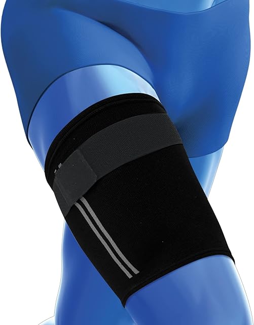 Kedley Thigh Support Sleeve | Advanced Elasticated Compression Band with Strap | Pulled Hamstring, Strained or Bruised Muscles and Quad Injuries | Protects and Aids Active Rehabilitation (M/L) Black