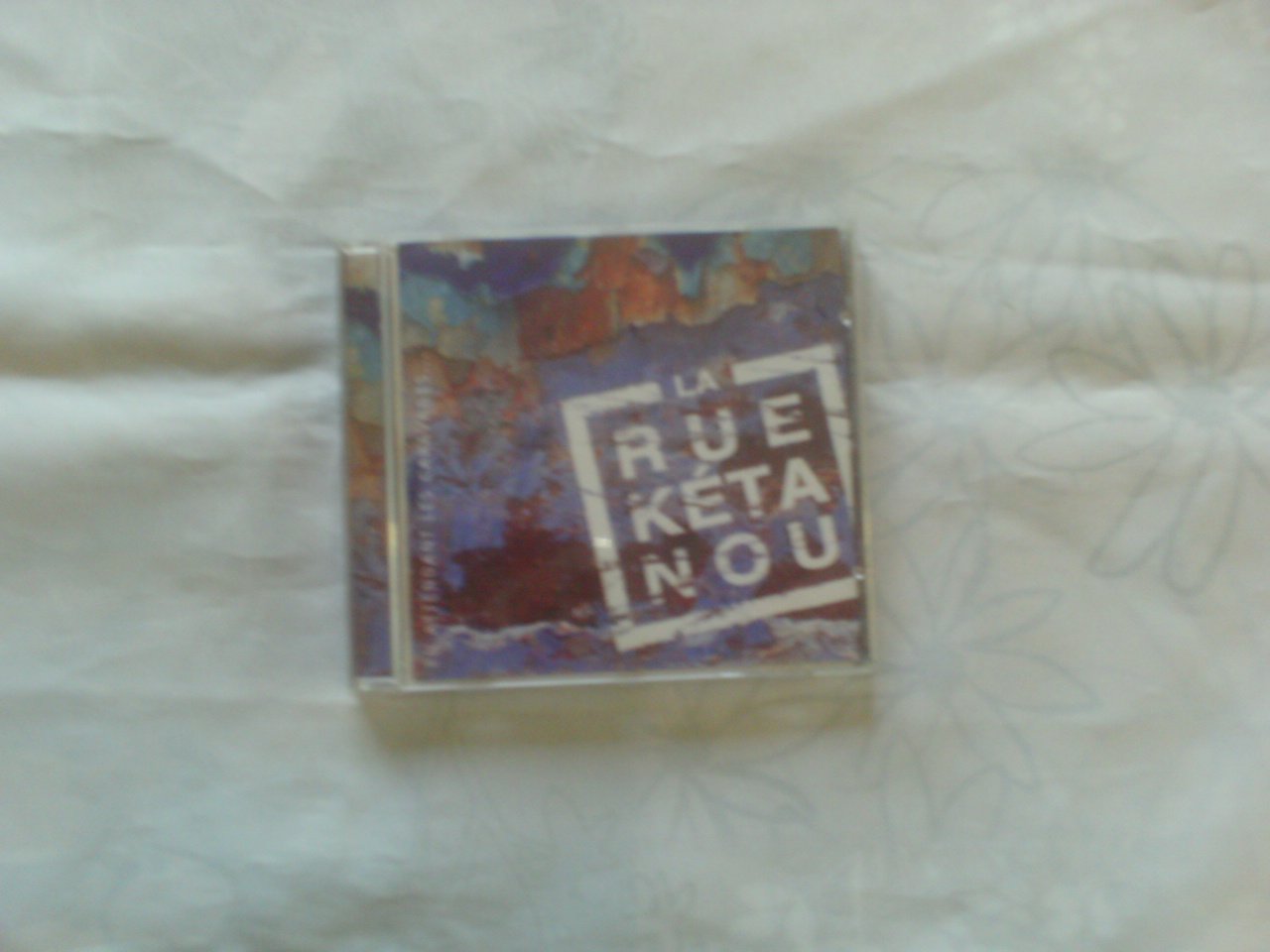 En Attendant Les Caravanes ... [Audio CD] Rue Ketanou