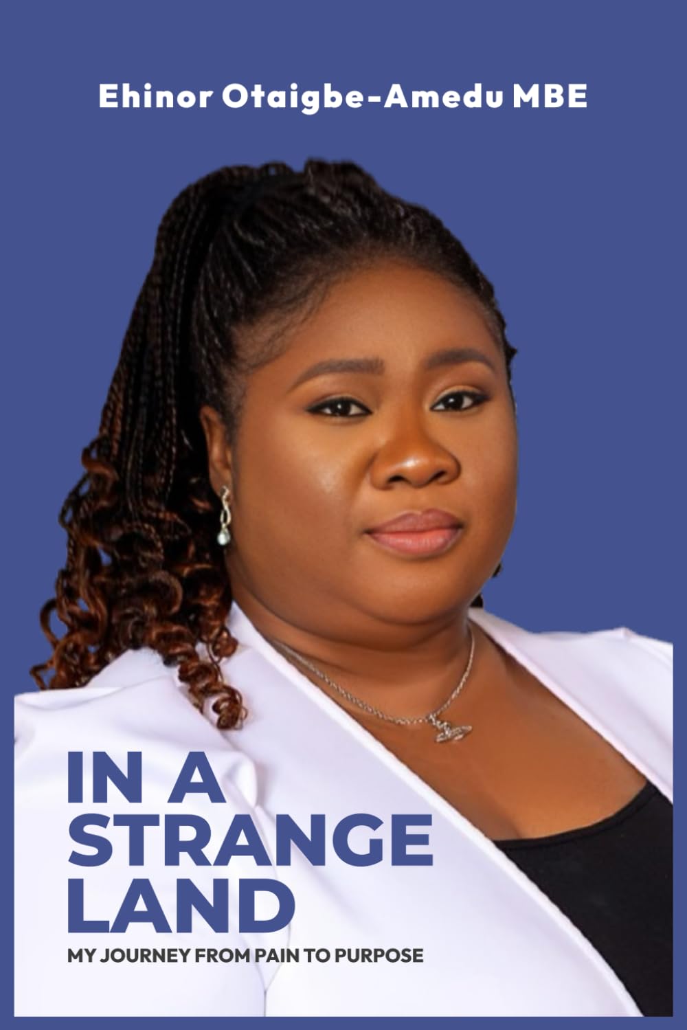 In a Strange Land: My Journey from Pain to Purpose