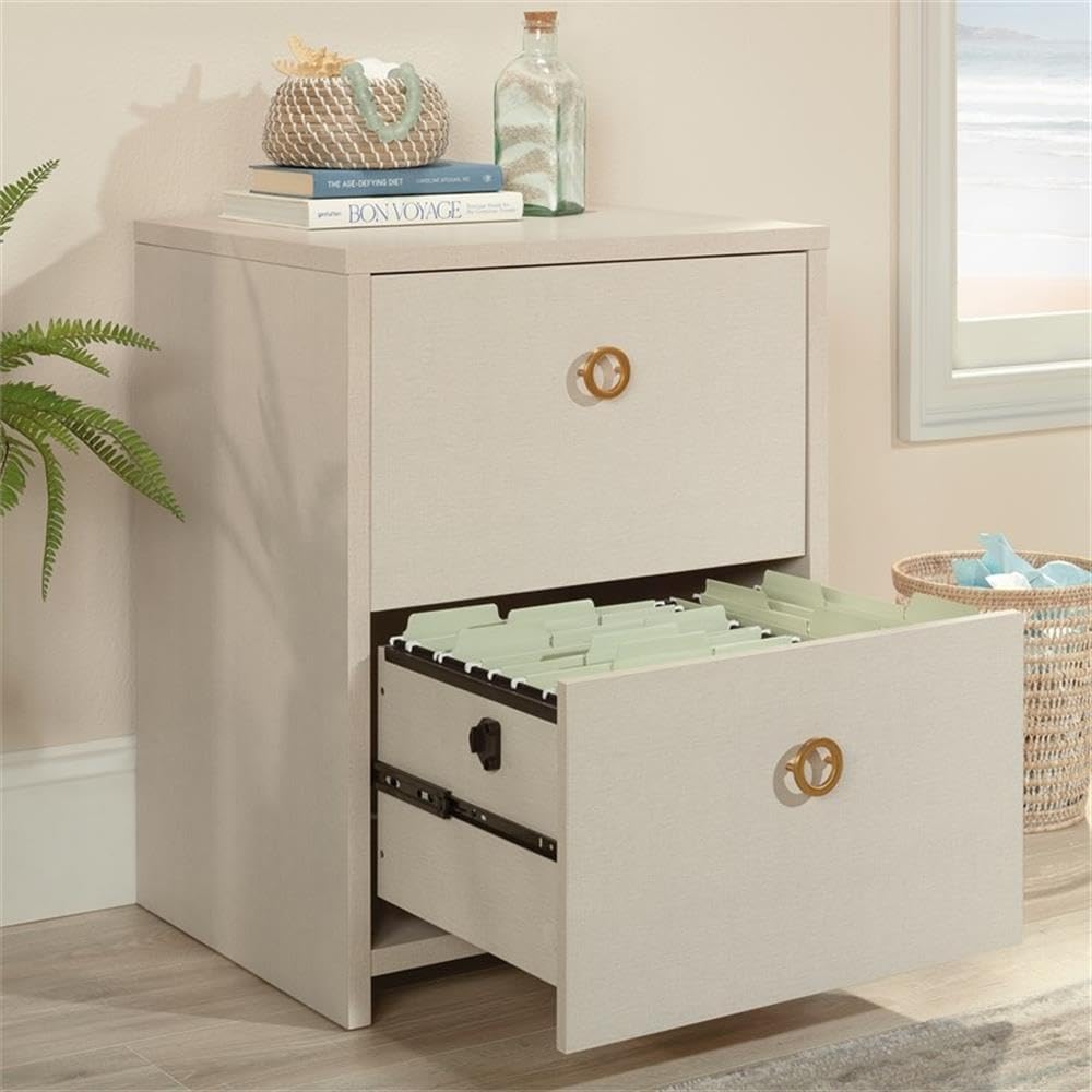 Bottom drawer of the file cabinet fully extended, filled with hanging files